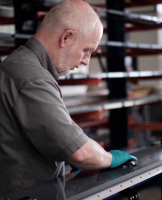 Hershey's Metal Meister employee working on a metal piece at the factory in Mattoon, Illinois